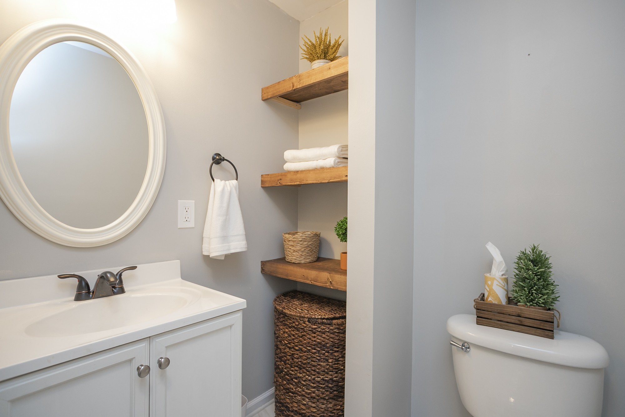 1124 Jacksons View Road Hermitage, TN 37076 - Photo 18 of 22 a bathroom with a sink a toilet and a mirror