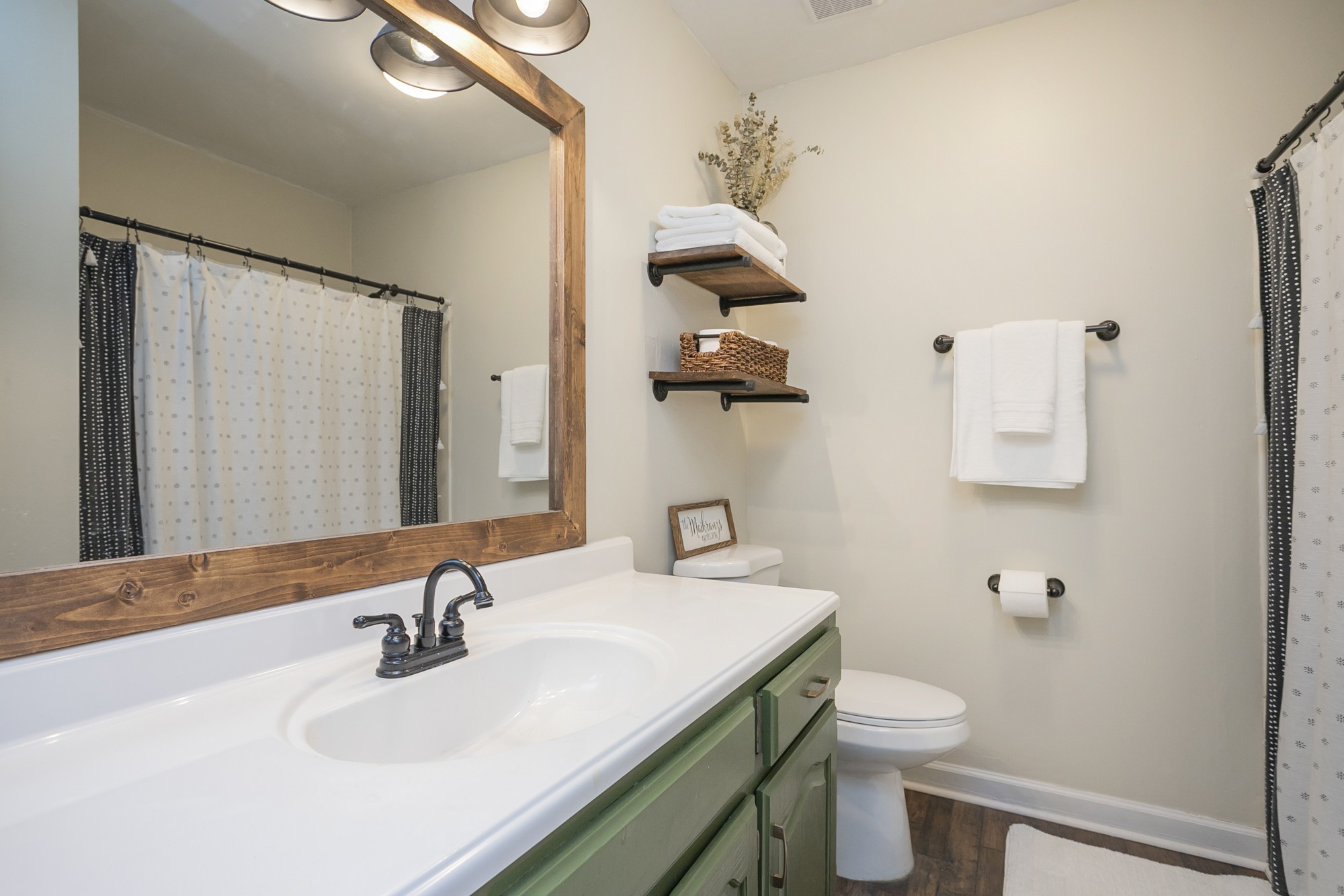 1124 Jacksons View Road Hermitage, TN 37076 - Photo 10 of 22 a bathroom with a sink toilet and mirror