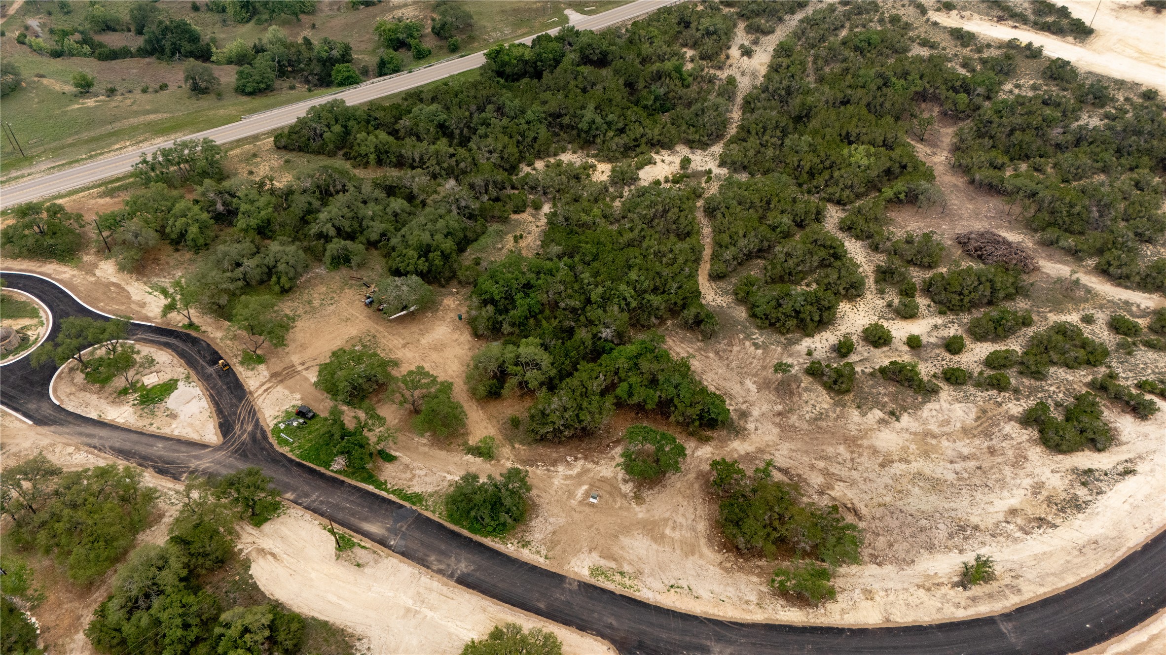 Lot 1 Ranch Road 165 Dripping Springs, TX 78620 - Photo 5 of 10 an aerial view of a house with a yard
