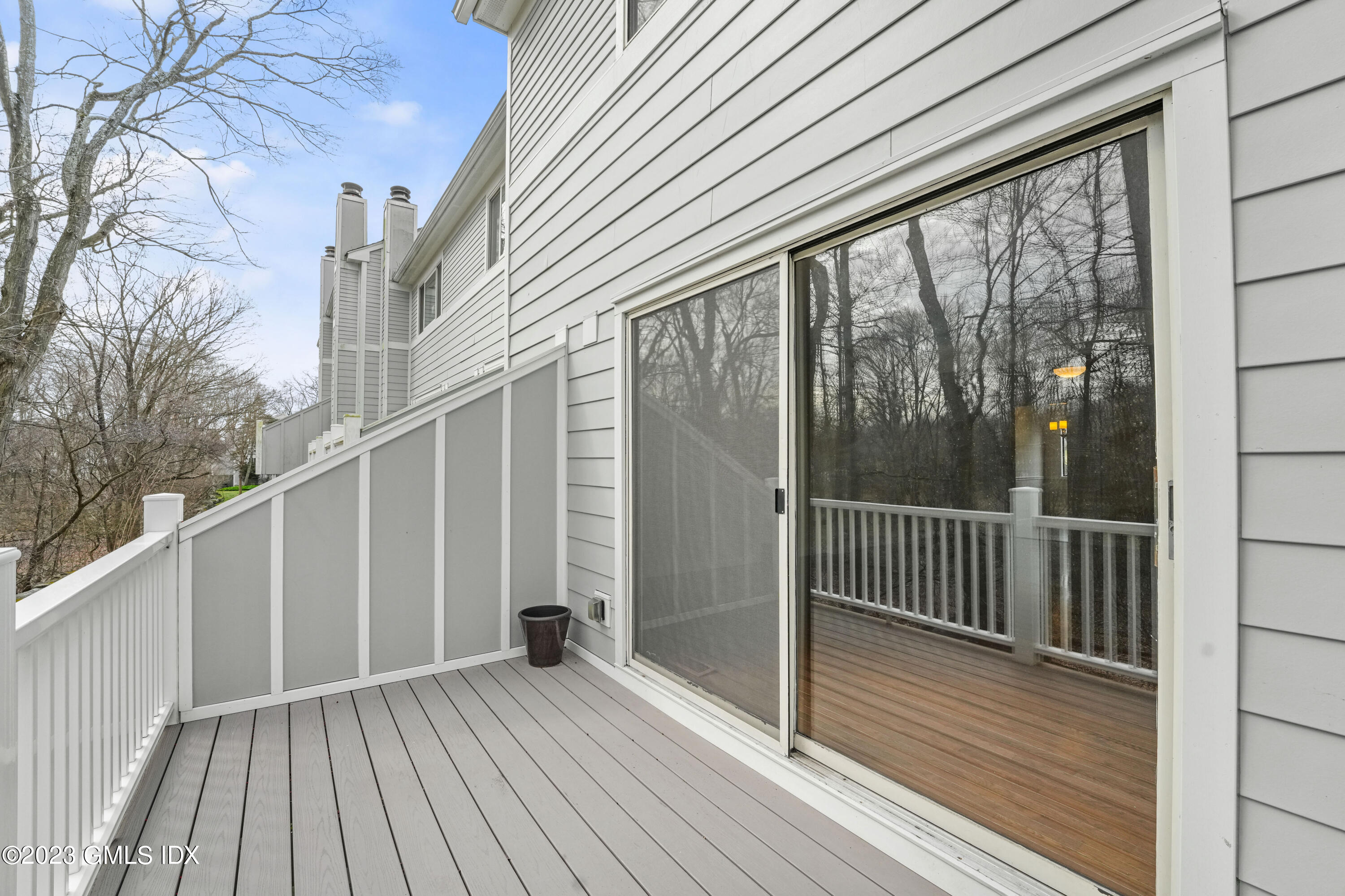 76 Silo Circle, Unit 76 Riverside, CT 06878 - Photo 12 of 40 a view of a wooden deck