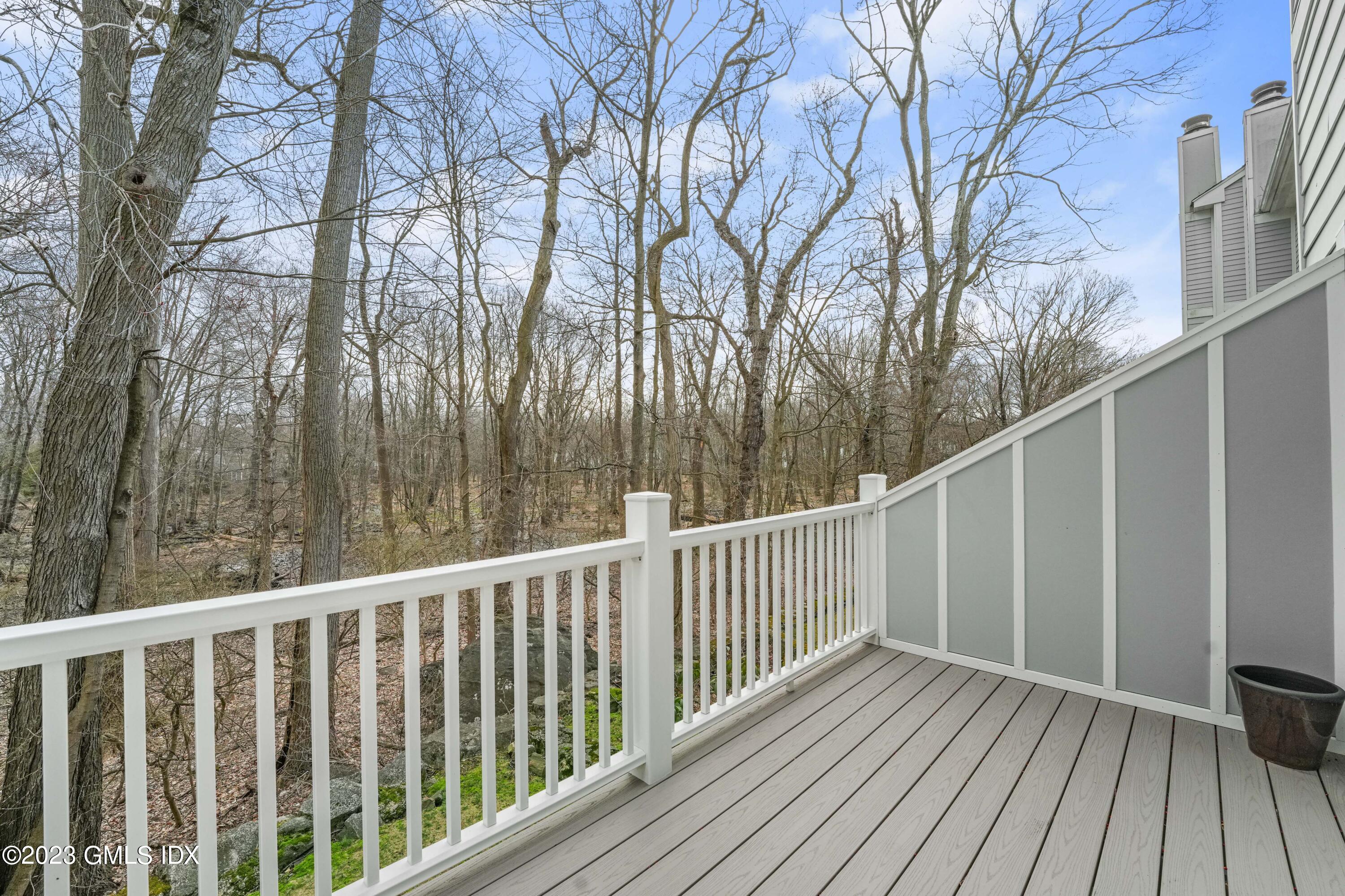 76 Silo Circle, Unit 76 Riverside, CT 06878 - Photo 13 of 40 a view of a wooden deck