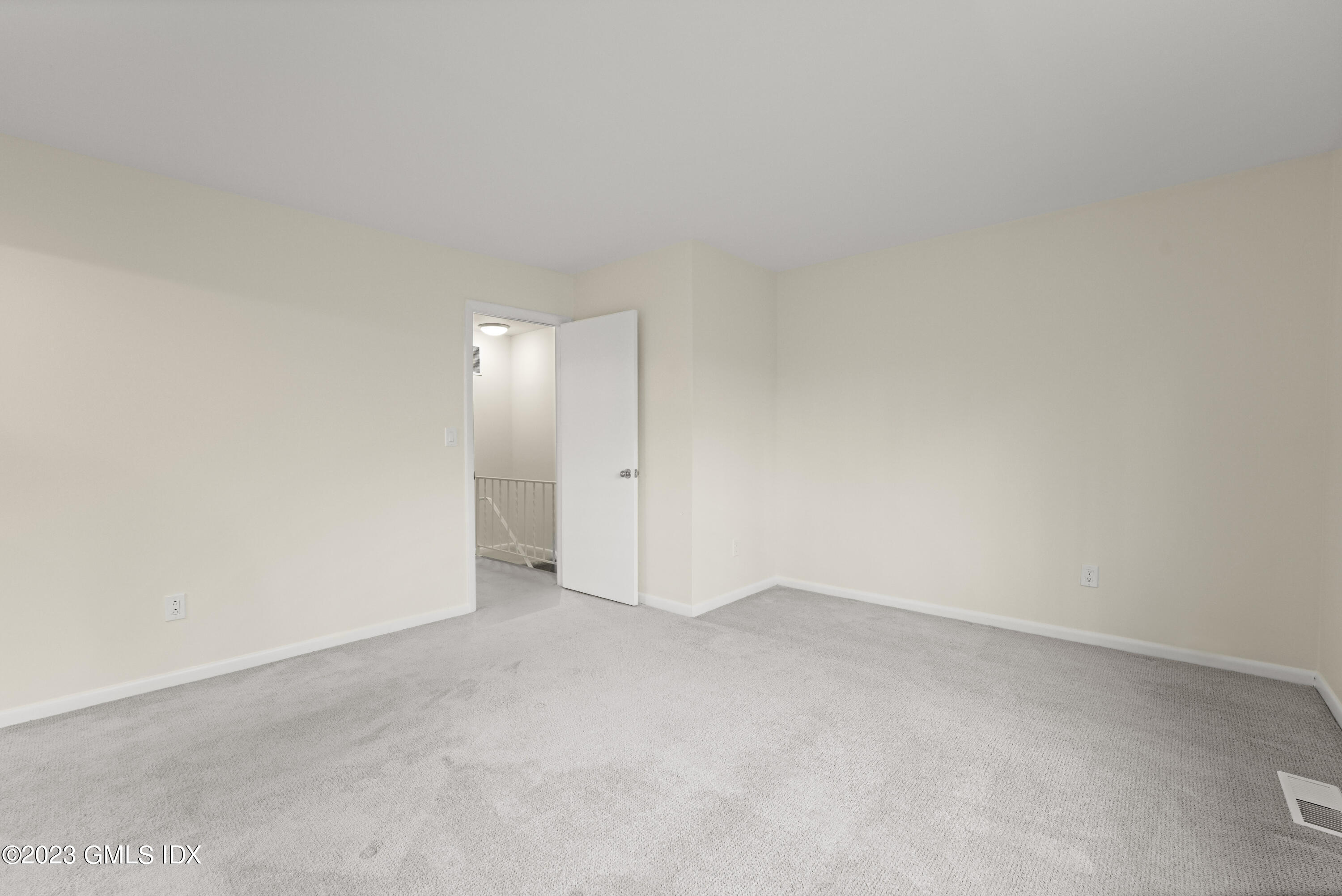 76 Silo Circle, Unit 76 Riverside, CT 06878 - Photo 23 of 40 an empty room with an entryway