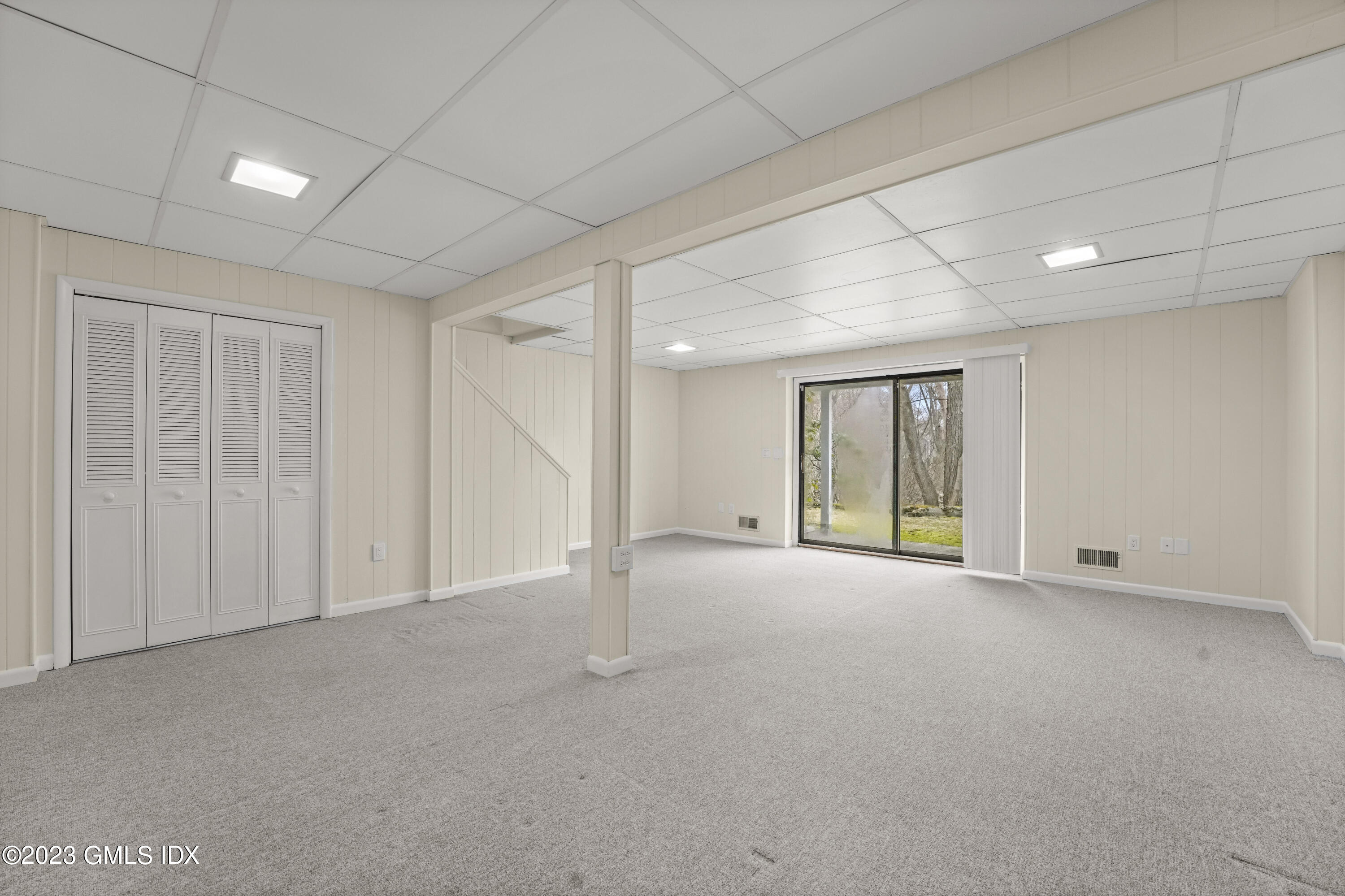 76 Silo Circle, Unit 76 Riverside, CT 06878 - Photo 28 of 40 a view of an empty room with a window