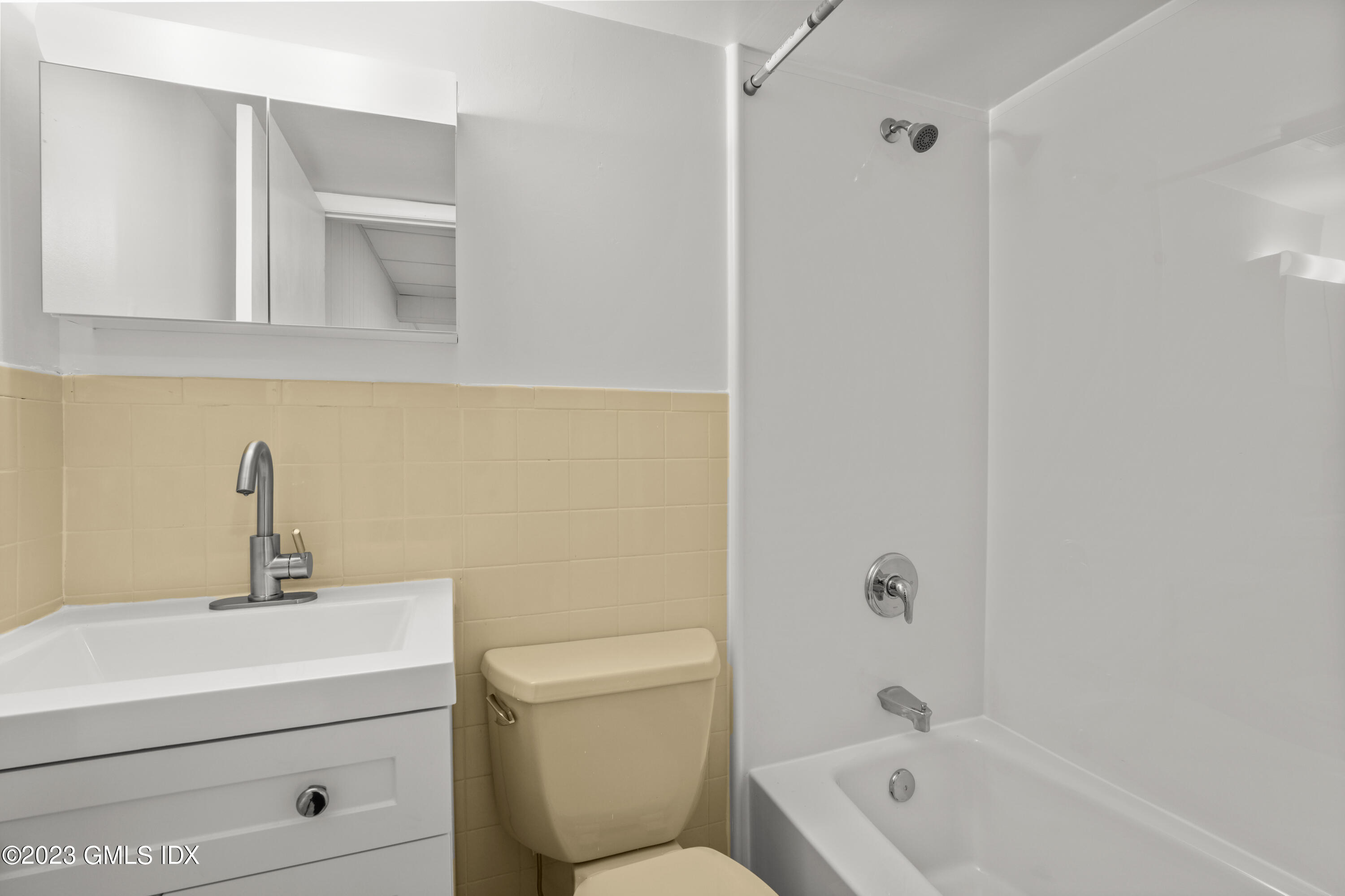 76 Silo Circle, Unit 76 Riverside, CT 06878 - Photo 30 of 40 a bathroom with a sink a toilet and shower