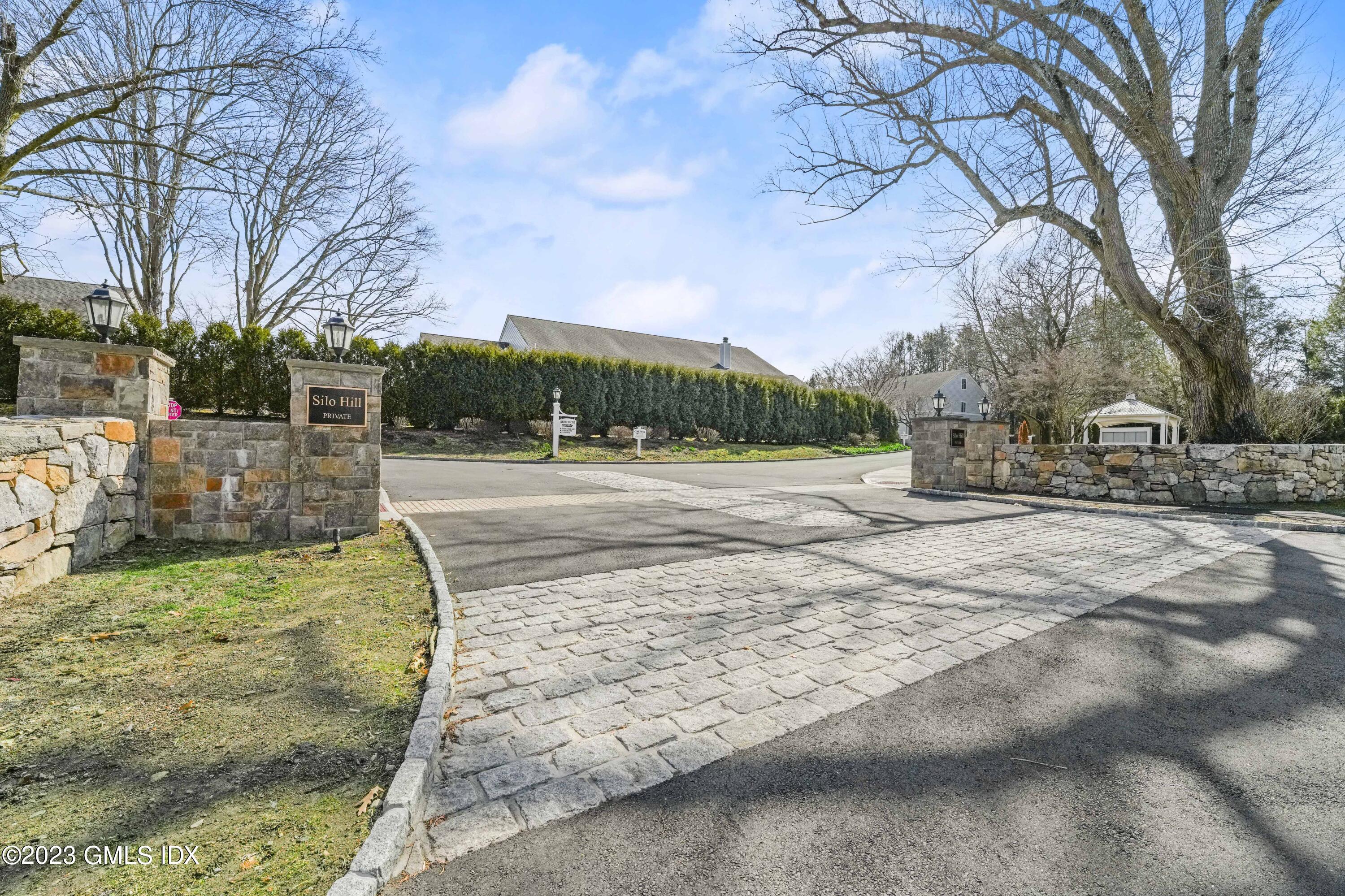 76 Silo Circle, Unit 76 Riverside, CT 06878 - Photo 33 of 40 a view of road with large trees