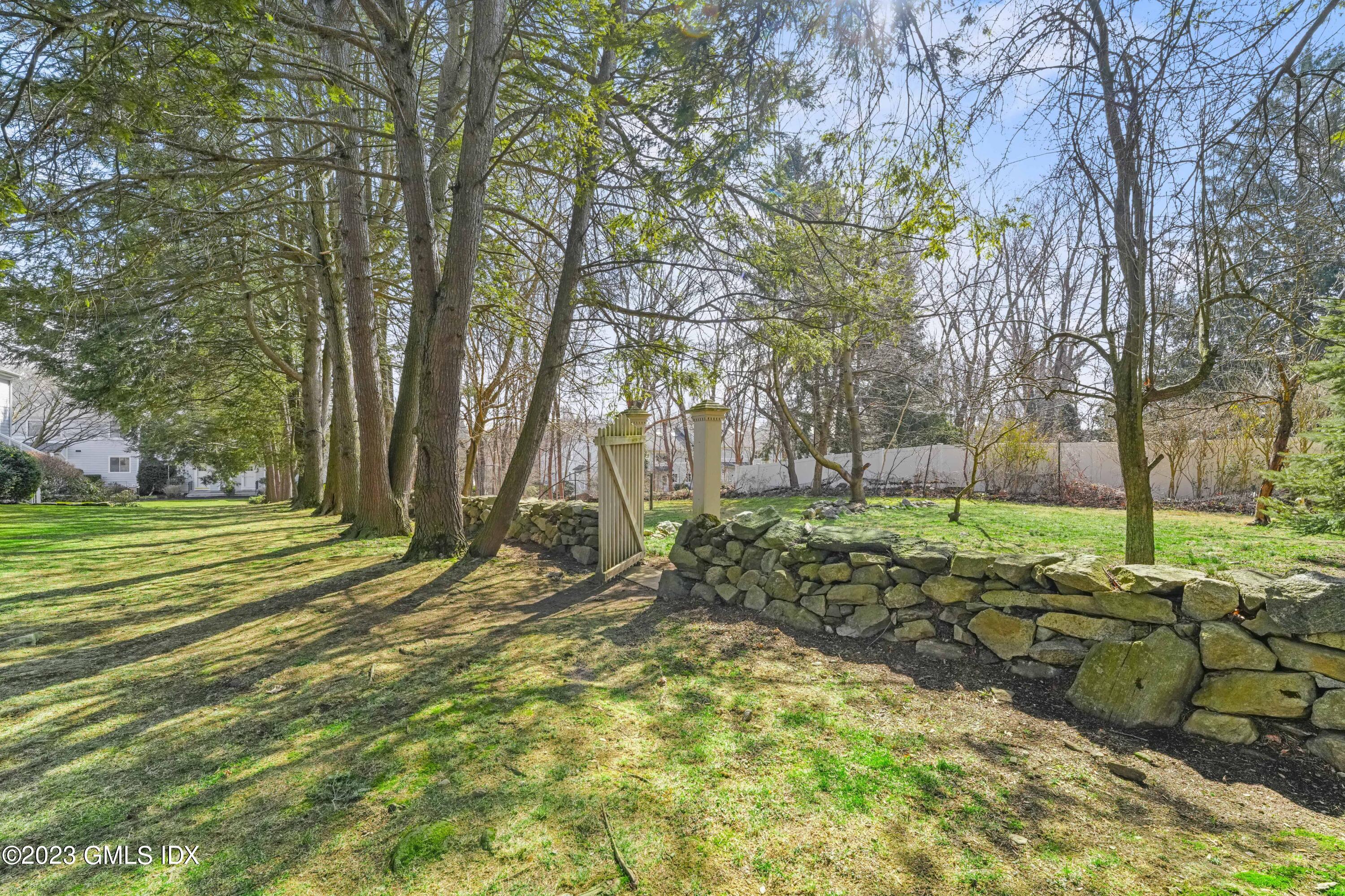 76 Silo Circle, Unit 76 Riverside, CT 06878 - Photo 34 of 40 a view of a yard with tree s