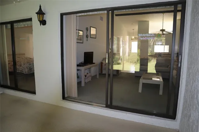 a room with a door open to a room