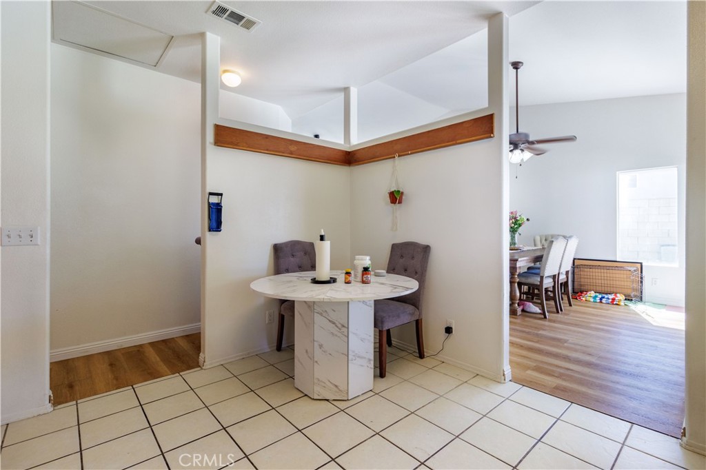 1393 Rabbit Peak Way Hemet, CA 92545 - Photo 15 of 34 a work room with furniture and a table