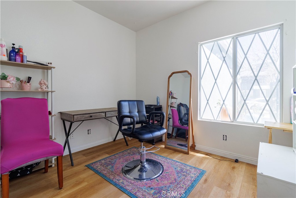 1393 Rabbit Peak Way Hemet, CA 92545 - Photo 16 of 34 a view of a workspace with furniture and a window