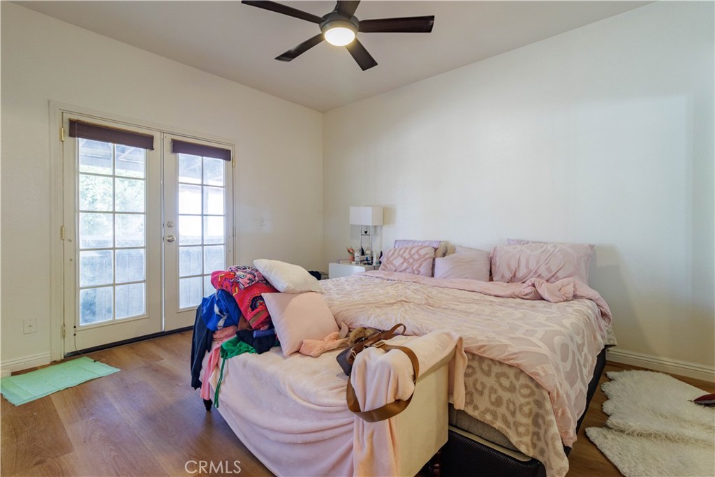 1393 Rabbit Peak Way Hemet, CA 92545 - Photo 19 of 34 a bed sitting in a bedroom next to a window