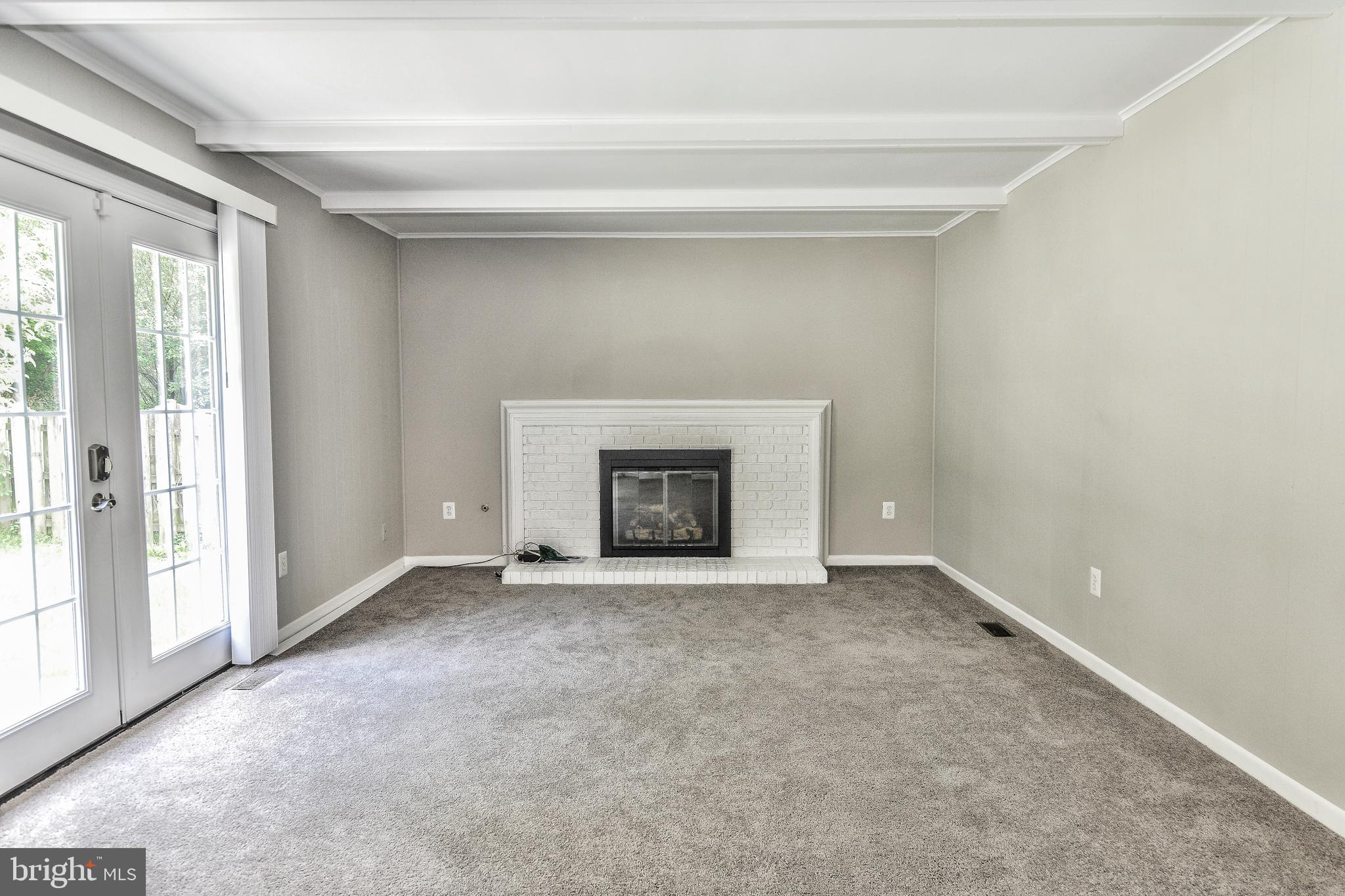 7903 Viola Street Springfield, VA 22152 - Photo 14 of 32 Brick gas fireplace
