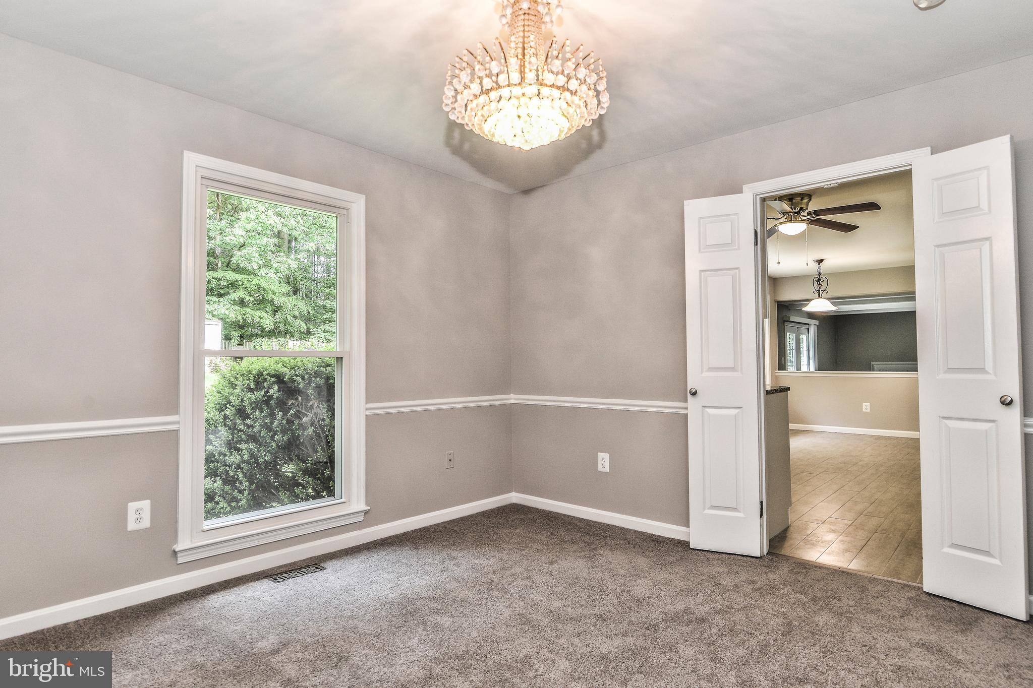 7903 Viola Street Springfield, VA 22152 - Photo 7 of 32 Formal dining room with french doors to kitchen