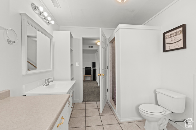 1099 Three Point Avenue Logan, UT 84321 - Photo 19 of 27 Full bathroom with vanity, tile patterned flooring, and a shower