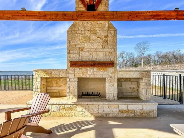 a view of a swimming pool with an outdoor seating