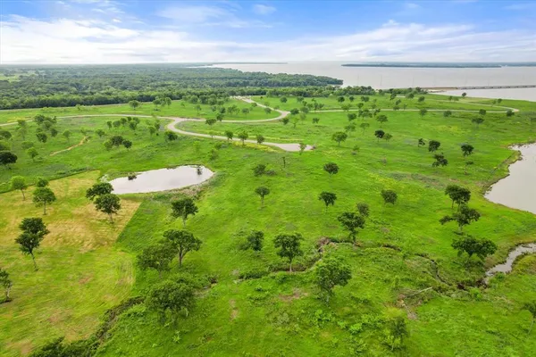 a view of a big yard with green space