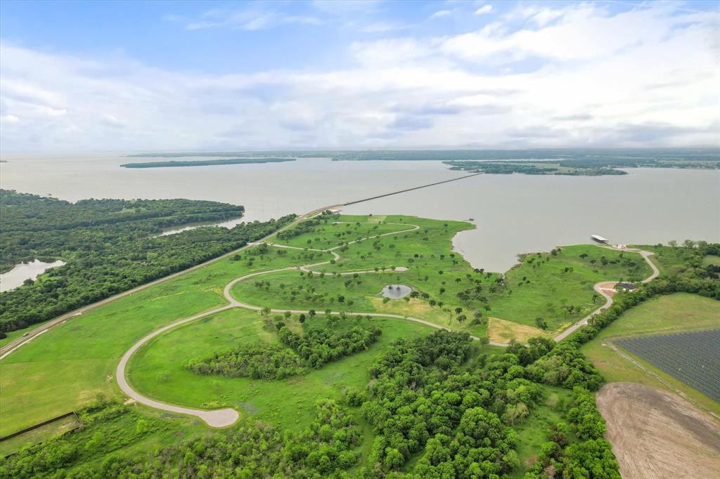 36 Chambers Bay Kerens, TX 75144 - Photo 9 of 22 a view of a lake with a city