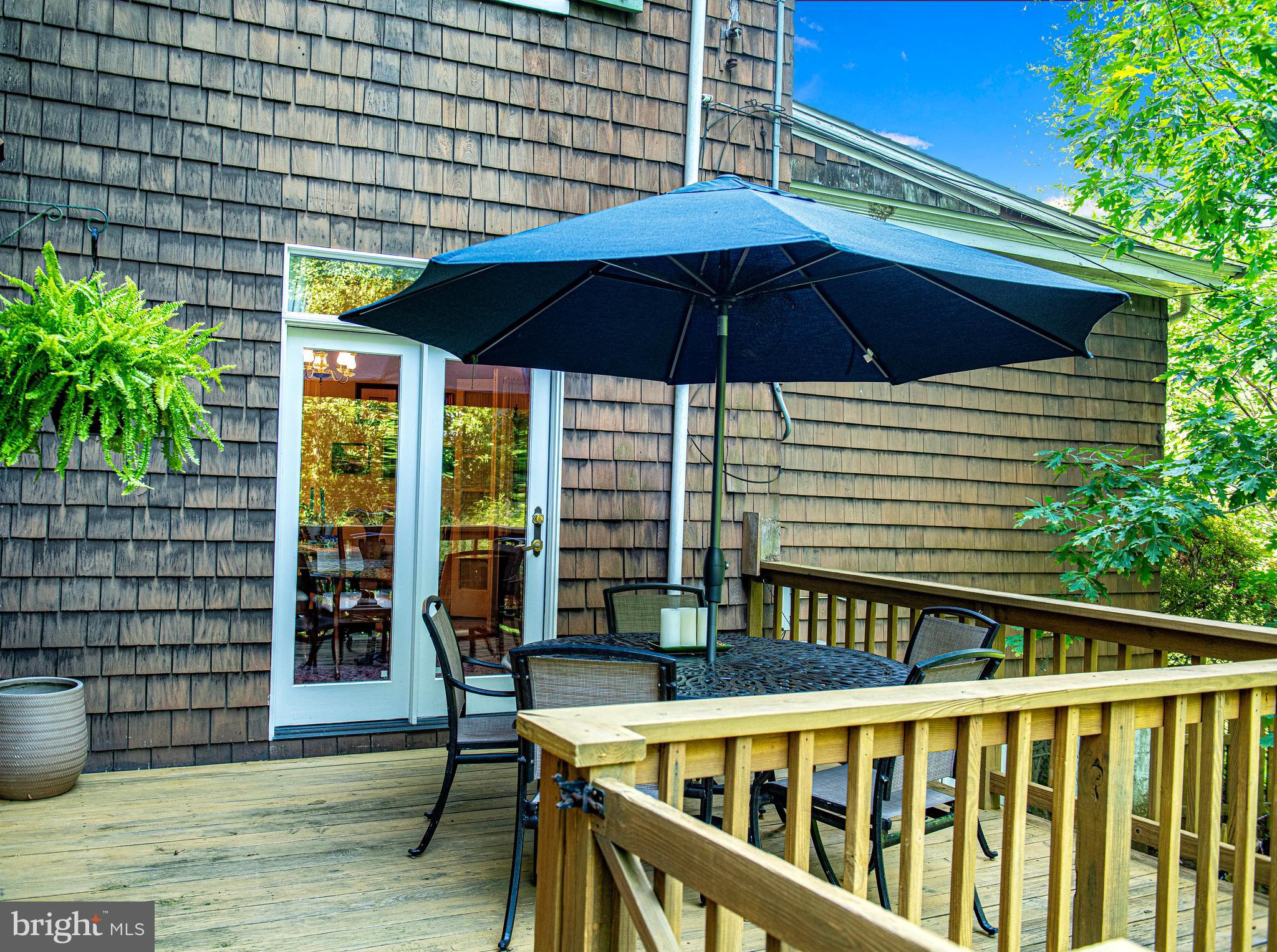 1014 Windsor Road Baltimore, MD 21208 - Photo 32 of 50 Access the wood deck from the dinning room