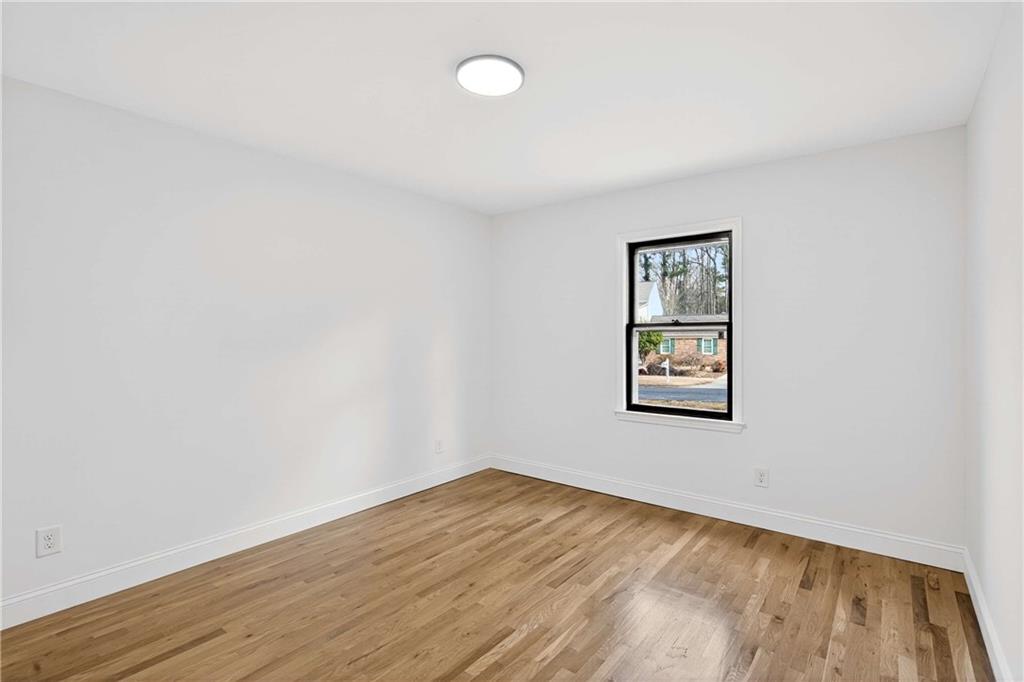 671 Willow Ridge Drive Northeast Marietta, GA 30068 - Photo 17 of 36 an empty room with a window