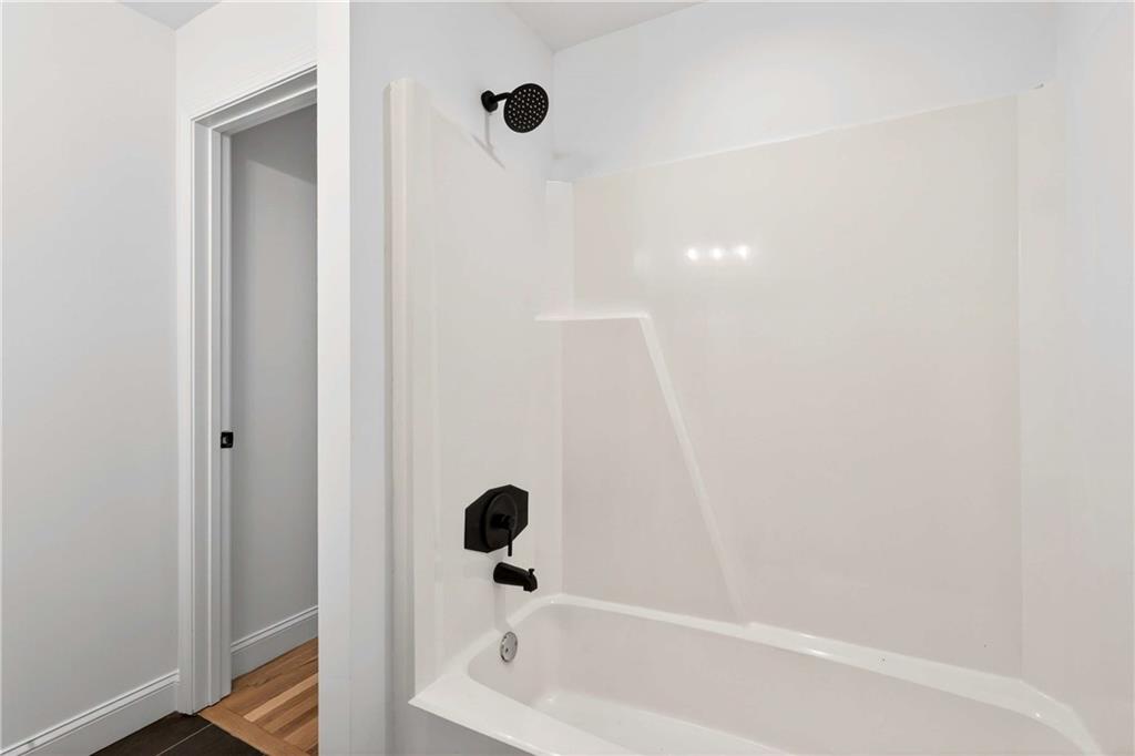 671 Willow Ridge Drive Northeast Marietta, GA 30068 - Photo 18 of 36 a bathroom with a bathtub