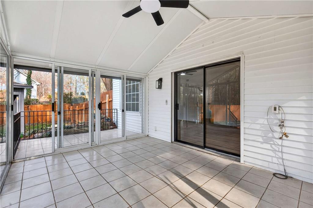 671 Willow Ridge Drive Northeast Marietta, GA 30068 - Photo 26 of 36 a view of empty room with wooden floor and fan