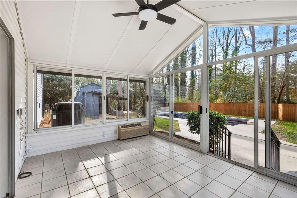 671 Willow Ridge Drive Northeast Marietta, GA 30068 - Photo 28 of 36 a living room with furniture and a large window