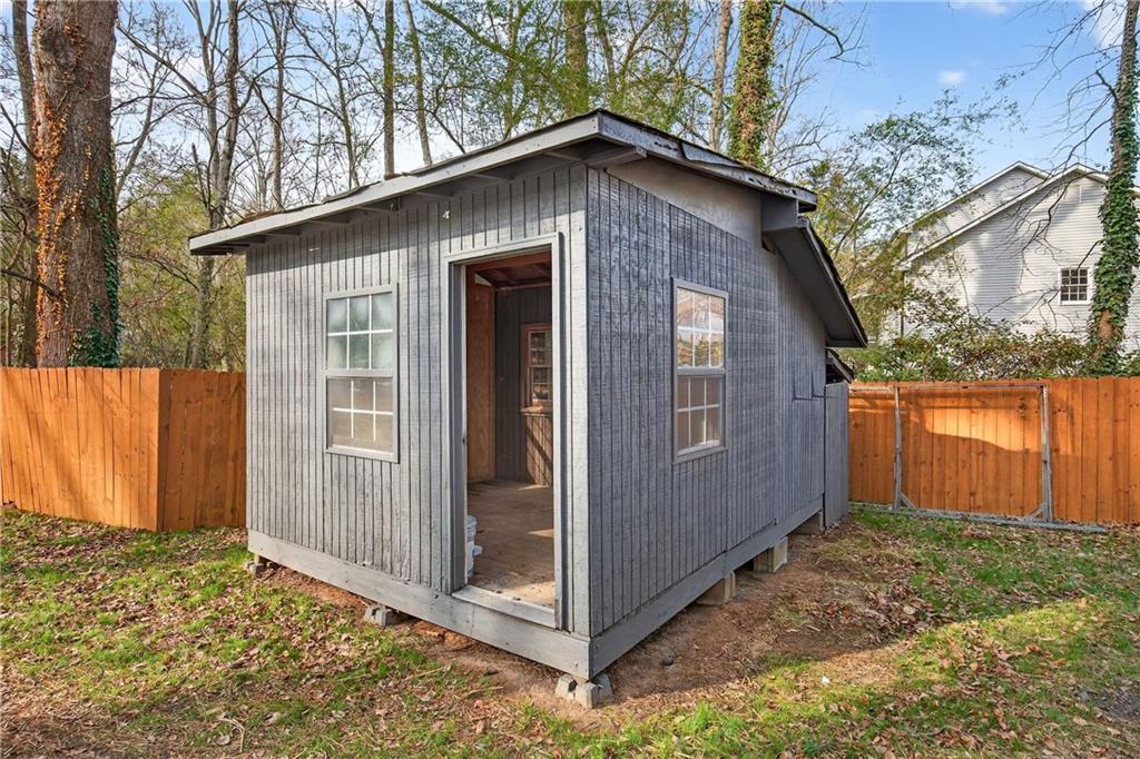 671 Willow Ridge Drive Northeast Marietta, GA 30068 - Photo 31 of 36 a view of a house with a yard