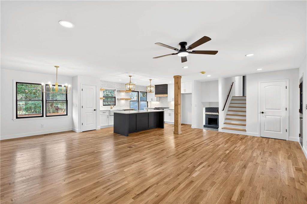 671 Willow Ridge Drive Northeast Marietta, GA 30068 - Photo 6 of 36 a view of kitchen with wooden floor and window