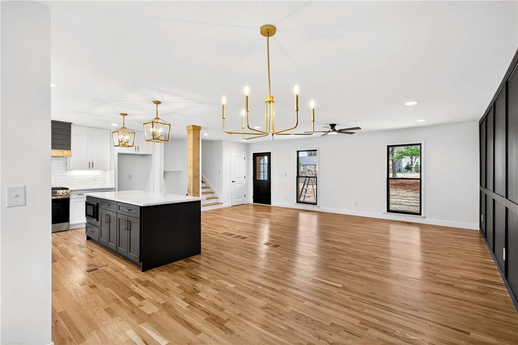 671 Willow Ridge Drive Northeast Marietta, GA 30068 - Photo 7 of 36 a view of kitchen with cabinets and wooden floor