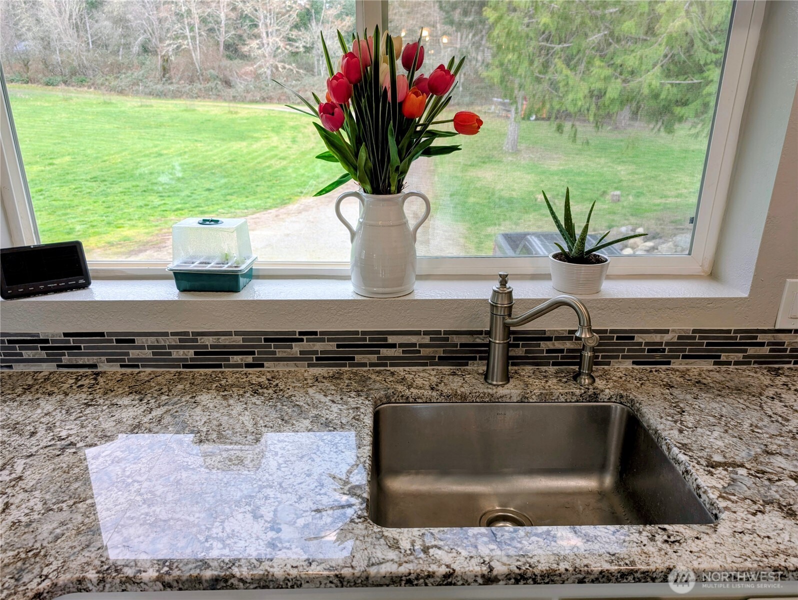 11108 Bliss Cochrane Road Northwest Gig Harbor, WA 98329 - Photo 16 of 39 a view of a kitchen counter space