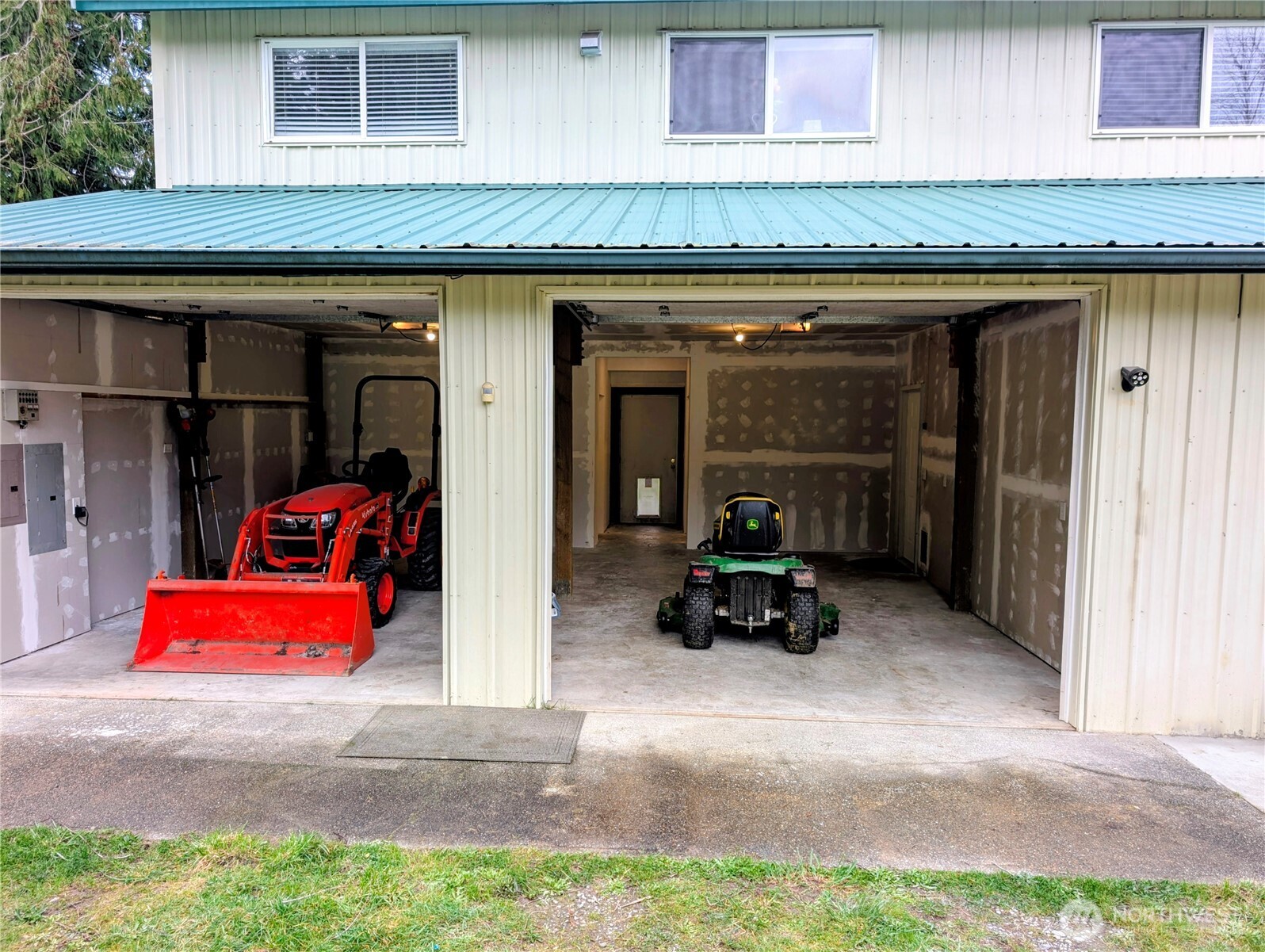 11108 Bliss Cochrane Road Northwest Gig Harbor, WA 98329 - Photo 24 of 39 a view of the porch with furniture and front view of a house