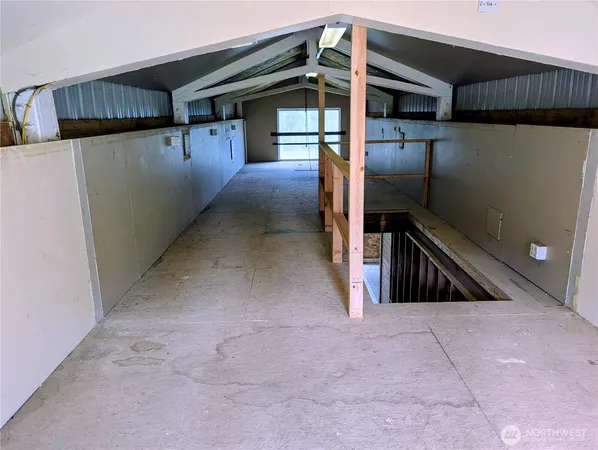 a view of a hallway with a door