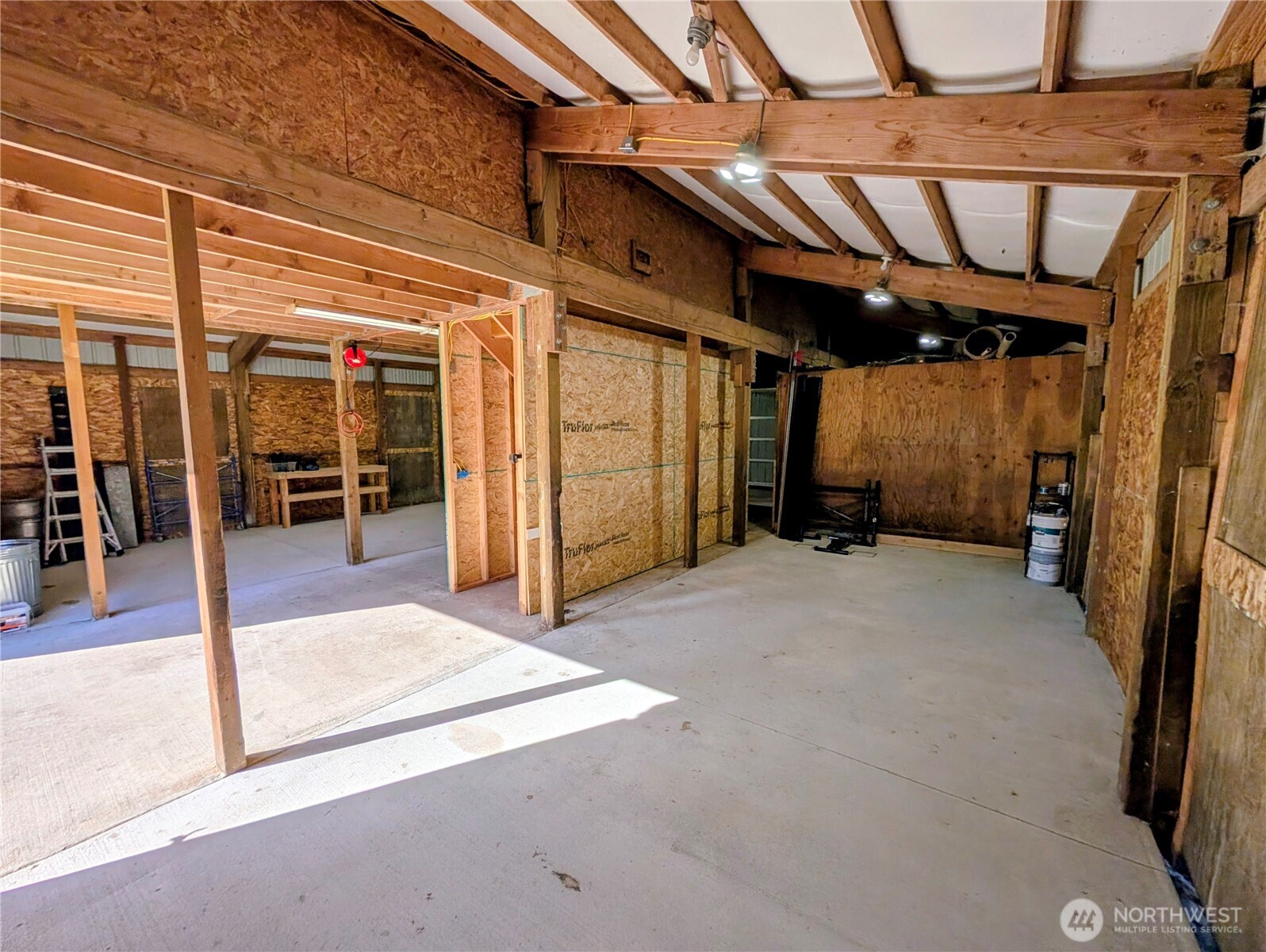 11108 Bliss Cochrane Road Northwest Gig Harbor, WA 98329 - Photo 36 of 39 a view of empty room with wooden floor