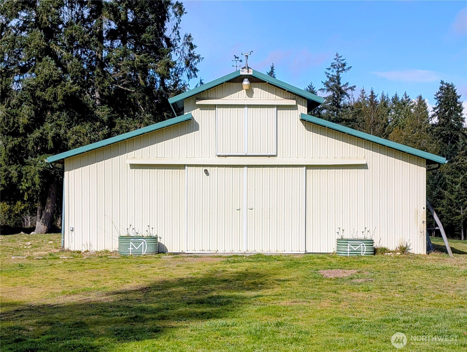11108 Bliss Cochrane Road Northwest Gig Harbor, WA 98329 - Photo 5 of 39 a house with a outdoor space