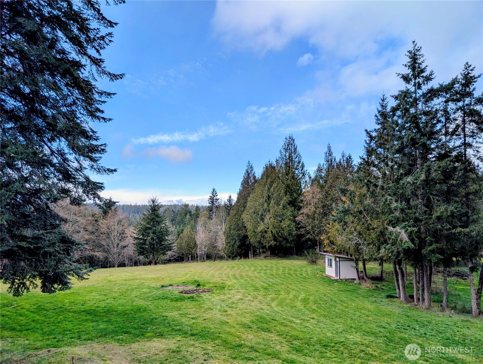 11108 Bliss Cochrane Road Northwest Gig Harbor, WA 98329 - Photo 8 of 39 a view of an outdoor space and a yard