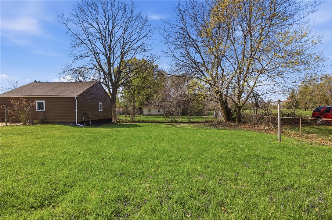 1925 Sunset Avenue Springfield, OH 45505 - Photo 42 of 45 This expansive green yard offers ample space for various outdoor activities.