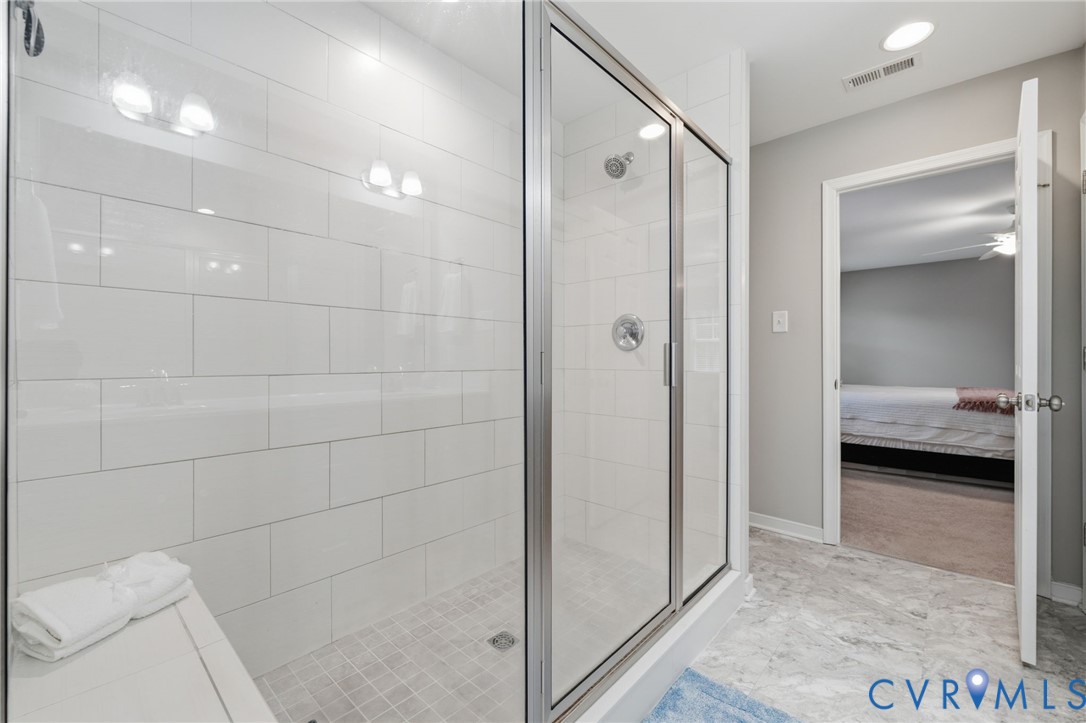 7598 Rural Point Road Mechanicsville, VA 23116 - Photo 25 of 41 a view of a bathroom with mirror