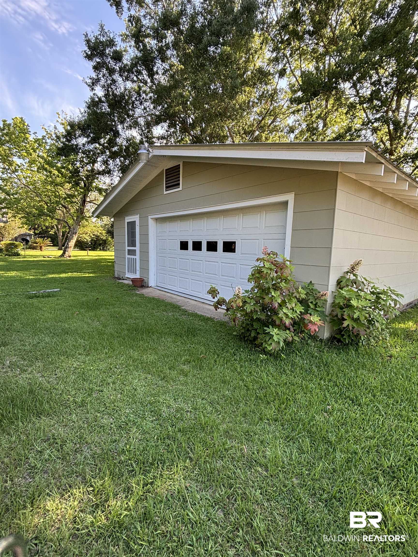 216 West Orange Avenue Foley, AL 36535 - Photo 6 of 37 View of garage