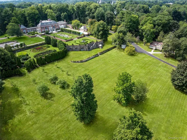 a view of a garden with houses