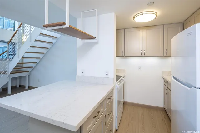 a view of kitchen and utility room