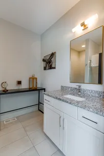 a table and a chair in a room