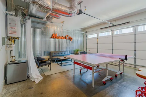 a bathroom with a tub and shower