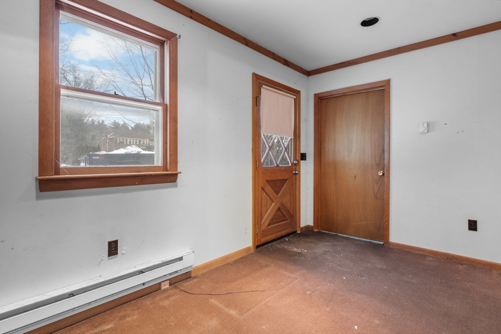 169 Nashua Road Pepperell, MA 01463 - Photo 15 of 31 an empty room with windows and closet
