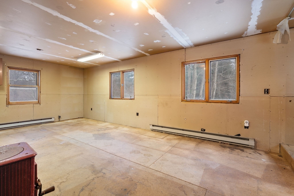 169 Nashua Road Pepperell, MA 01463 - Photo 20 of 31 a view of a livingroom with an empty space
