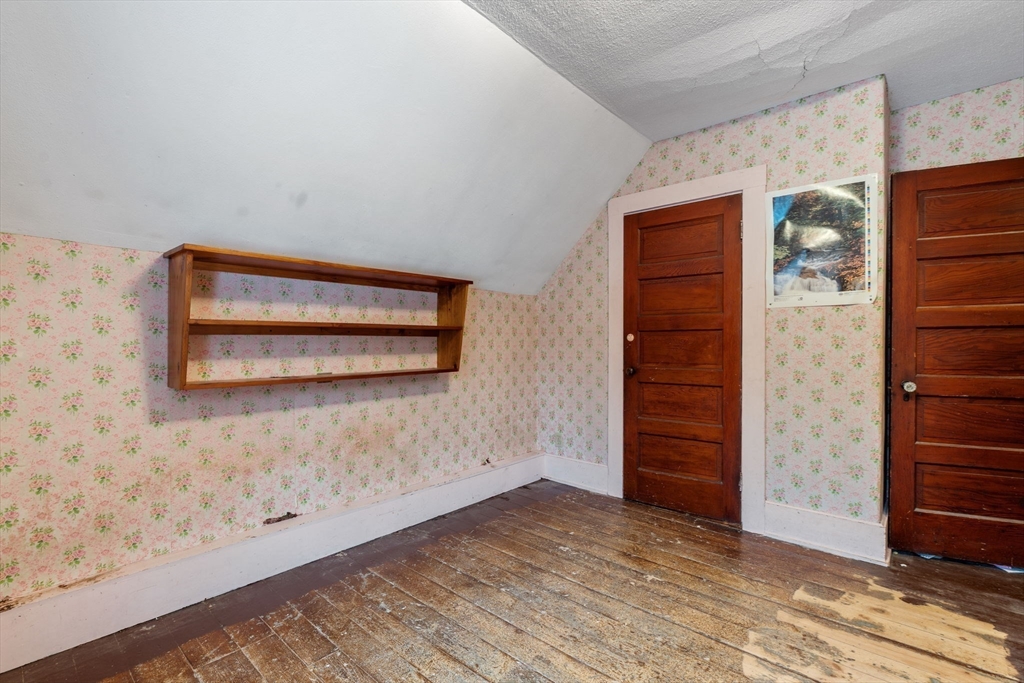 169 Nashua Road Pepperell, MA 01463 - Photo 23 of 31 an empty room with an entryway door