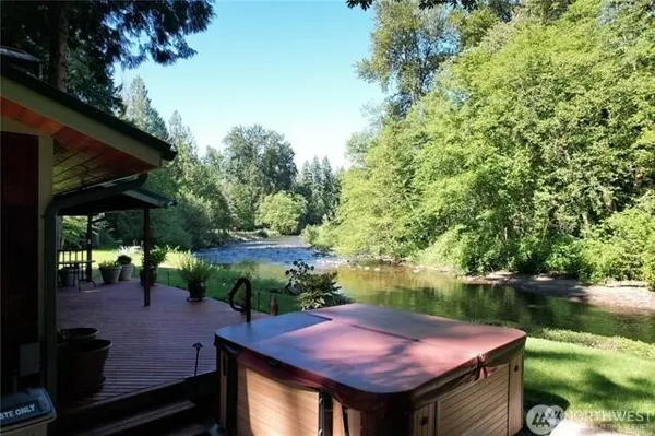 a view of swimming pool with a patio
