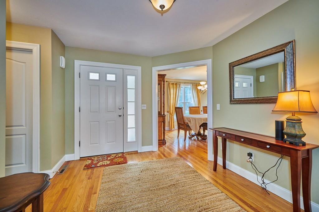 119 White Loaf Road Southampton, MA 01073 - Photo 5 of 41 a bedroom with a bed and a table with potted plant