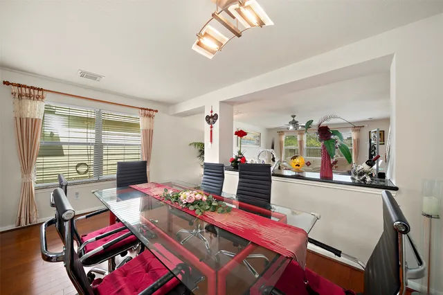 a room with furniture and a large window