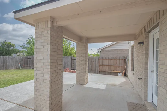 a view of a porch with a backyard