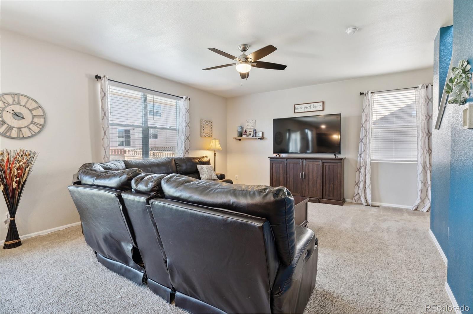 2328 Ruby Avenue Brighton, CO 80603 - Photo 8 of 21 a living room with furniture and a window