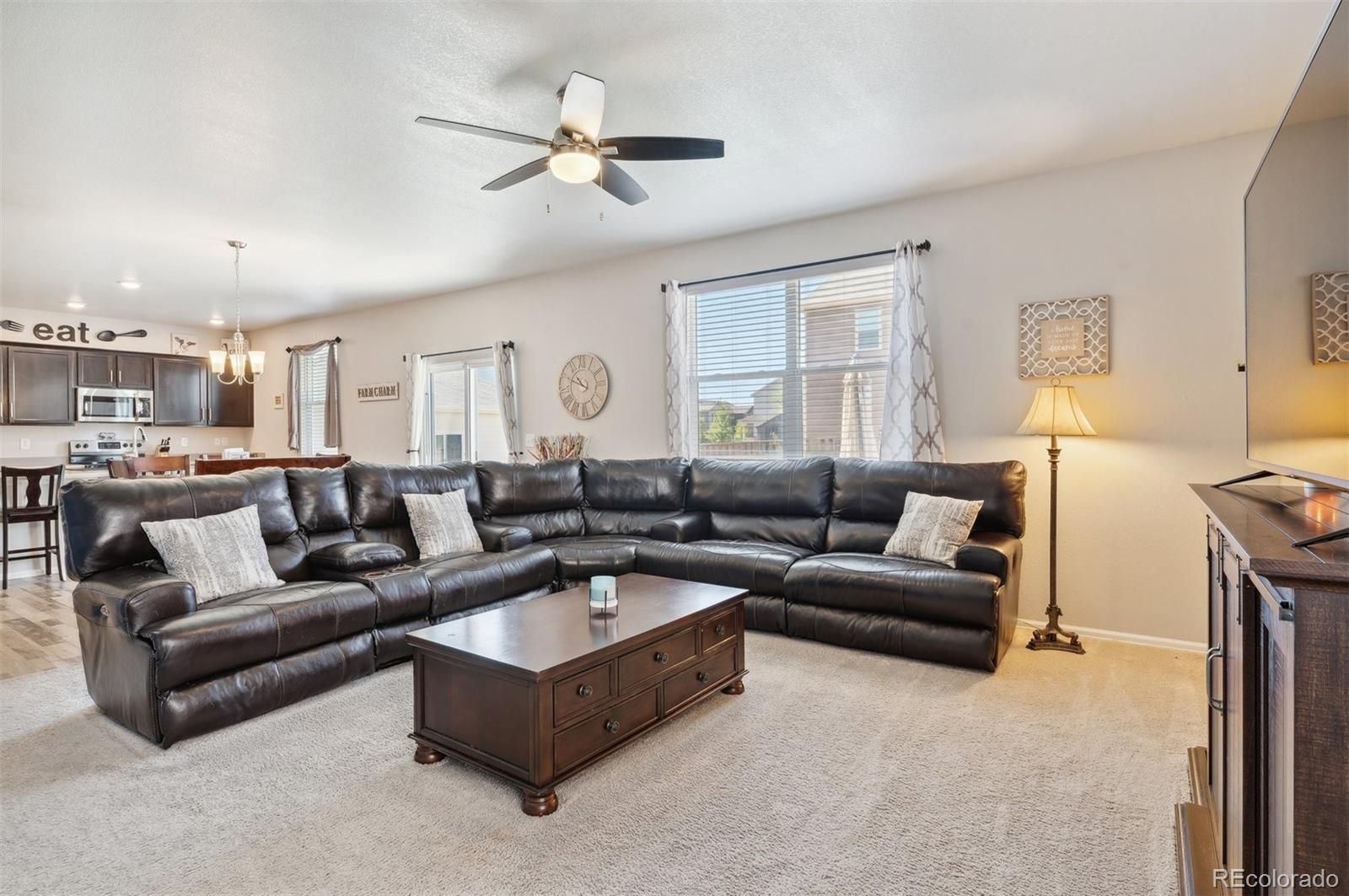 2328 Ruby Avenue Brighton, CO 80603 - Photo 9 of 21 a living room with furniture and a window